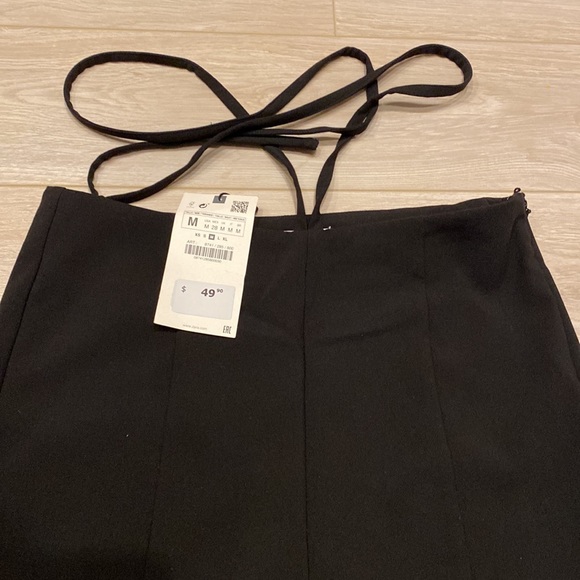 Split leg trousers with tie at the waist - Picture 2 of 5